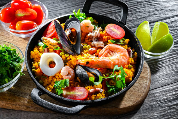 istock Seafood paella served in a cast iron pan 2182672529