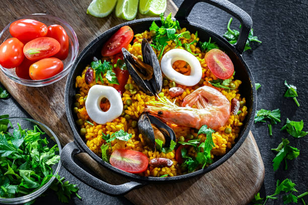 istock Seafood paella served in a cast iron pan 2182672621