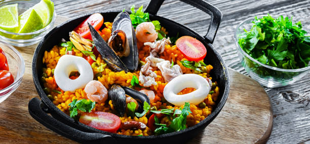 istock Seafood paella served in a cast iron pan 2182672742