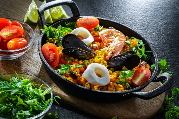istock Seafood paella served in a cast iron pan 2182672756