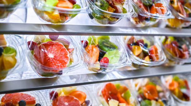 istock Boxes with pre-packaged fruit salads in a commercial fridge 2182675002