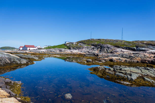 istock Scenic Coastal Landscape with Rocky Shoreline and Clear Sky 2182676172