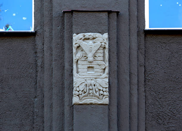 istock bee in the hive rests on the facade 2182679801