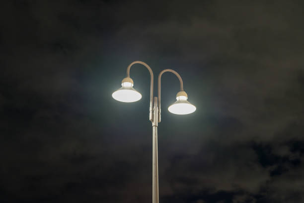 istock Material looking up at street lights at night. 2182680145