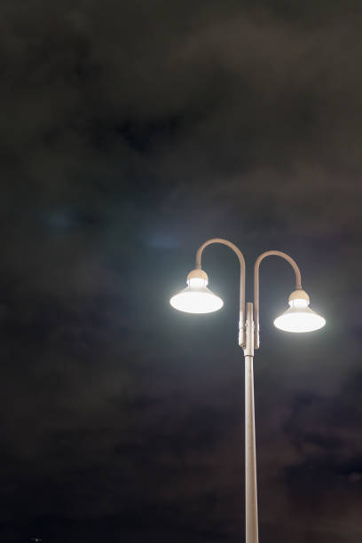 istock Material looking up at street lights at night. 2182680308