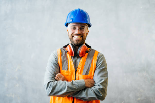 istock Studio shot of construction engineer in protective uniform, wearing reflective vest and hardhat 2182680324