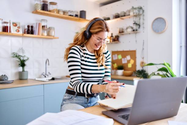 istock Smiling female person studying for school 2182688766
