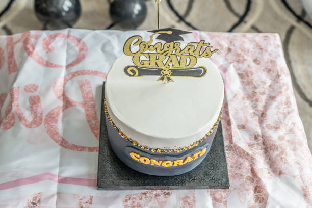 istock Graduation cake with decorations - close up view 2182690314