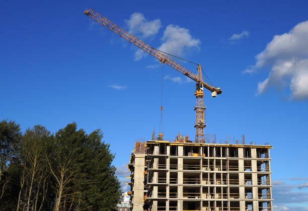 istock Construction site with jib cranes. Construction of Residential Building. 2182691562