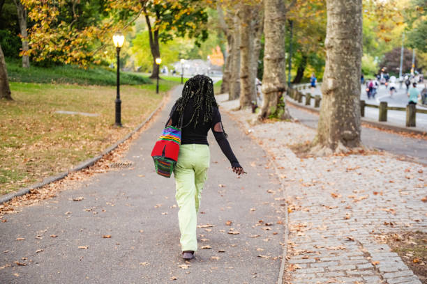 Young Black Woman Walking in Central Park