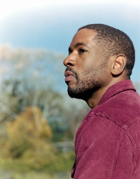 istock Pensive african american man contemplating outdoors in nature 2182696140