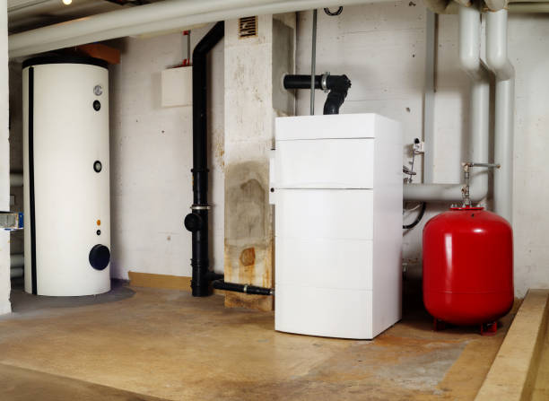 istock Heating system and hot water tank in residential building. 2182697562