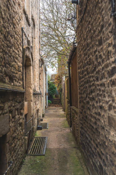 istock Narrow corridor between two houses made of clicker bricks 2182700208
