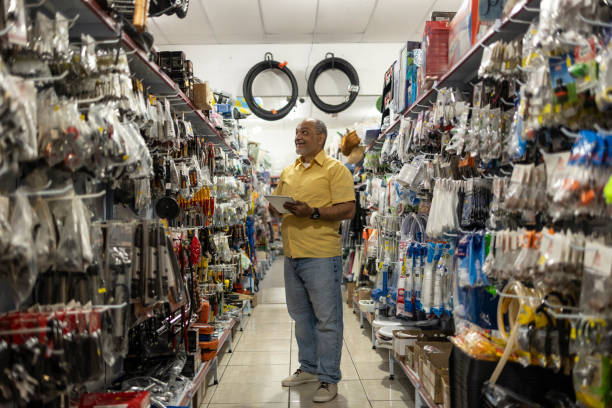 istock Man checking merchandise and stock with tablet in household goods store 2182706488