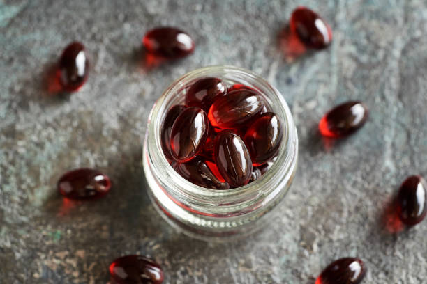 istock Red krill oil pills in a glass jar 2182709807