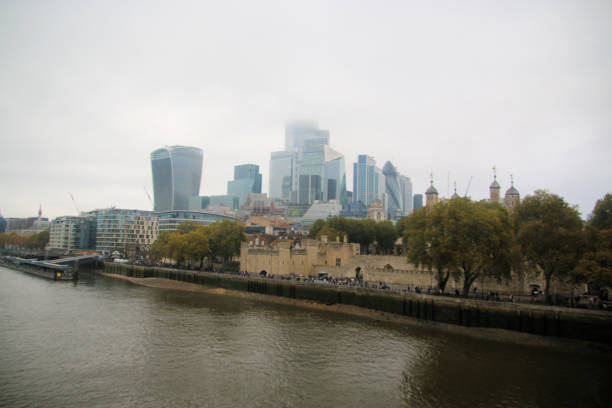 London, United Kingdom - May 30, 2023:  People waiting in a row for the entrance to the famous Tower of London.
