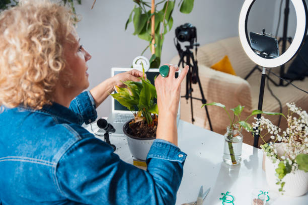 istock Mature woman vlogging on gardening 2182713526
