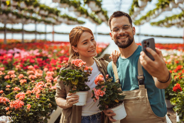 istock Flower nursery owners taking selfie 2182715471