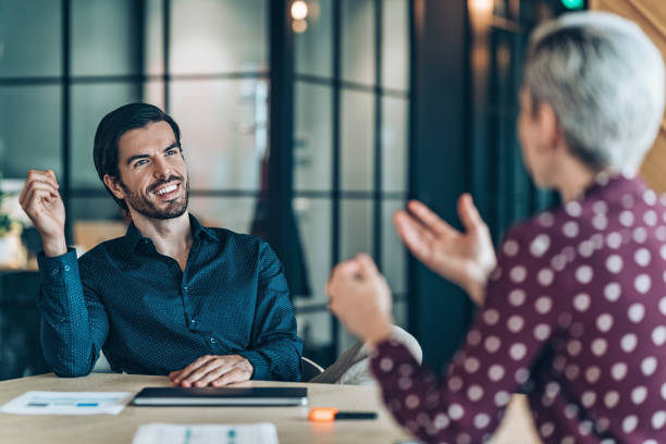 istock Business people, talking to each other, about work and new plans 2182716665