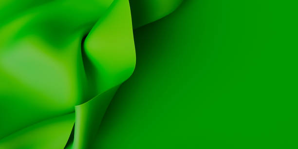 istock Green silk satin texture background. Curtain, drapery with place for text. Beautiful soft folds on the fabric. 2182719043
