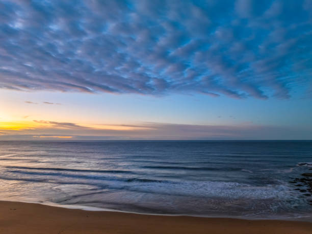 istock Winter seascape views over the beach with high and medium cloud cover 2182721497
