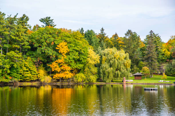 Mont St-Bruno, Canada - Oct. 13 2024: Colored fall season at the Lac Moulin on Mont St-Bruno