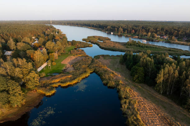 istock Serene River Landscape with Lush Forests and Small Islands 2182726226