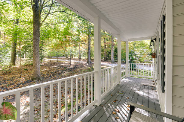 istock Charming Porch With White Railing And Forest View 2182739924