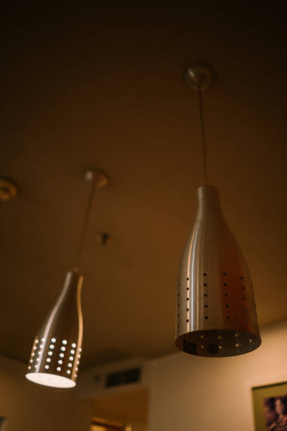istock A stylish hanging lamp in a hotel room 2182747004