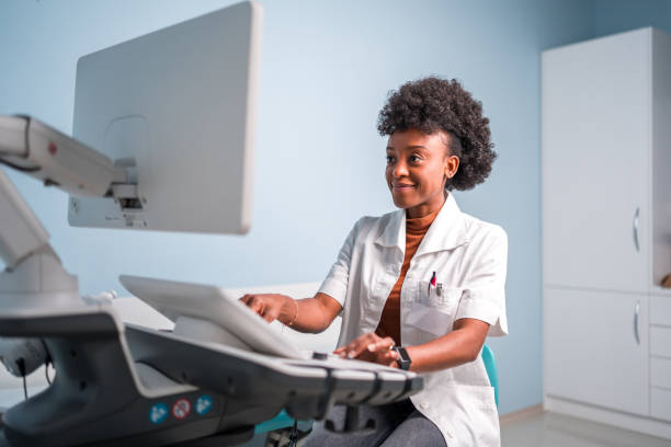 istock Mid Adult Black Female Sonographer Working at Rest 2182764352