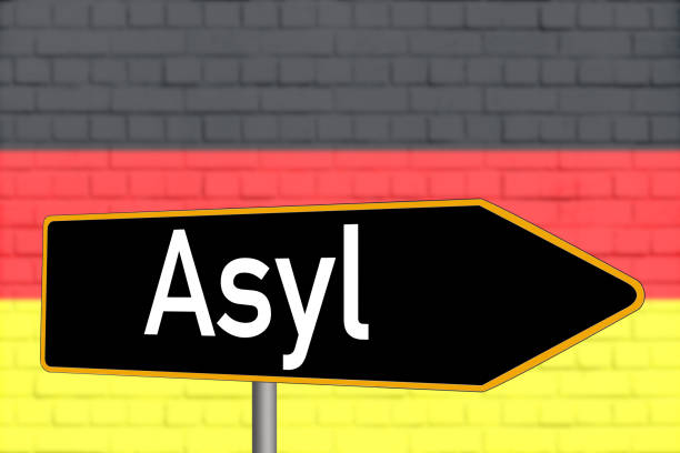 Deutschland und ein Schild mit dem Pfeil Asyl