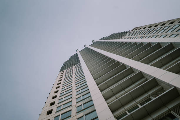 A tall hotel building standing majestically against the skyline, showcasing modern architecture and elegant design