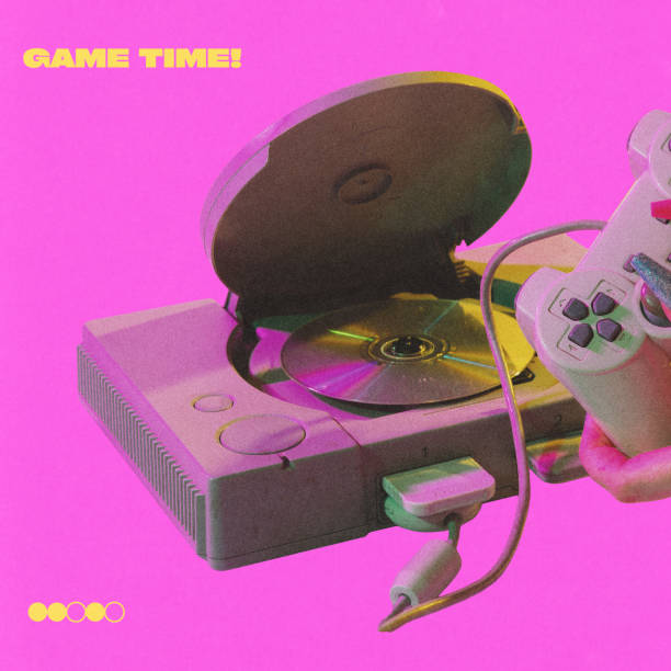 Poster. Contemporary art collage. Game time. Vintage video game console with controller and open disc tray against vibrant pink background Concept of nostalgia, retro, pop art, 90s. Y2k style.