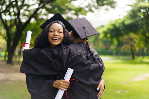 istock Happy and excited students in their graduation ceremony. 2182781541
