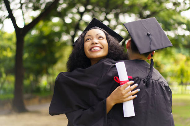 istock Happy and excited students in their graduation ceremony. 2182781555