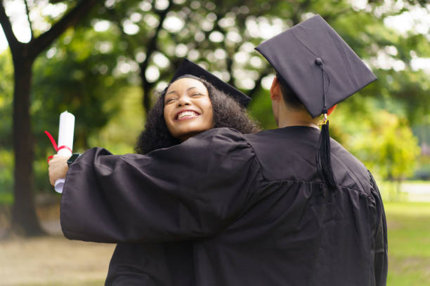 istock Happy and excited students in their graduation ceremony. 2182781556