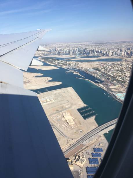 istock Aerial view of Dubai skyline with plane wing. 2182782714