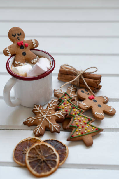 istock Gingerbread man bathing in cup of hot chocolate 2182784392