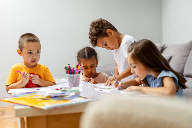 istock Children engaging in a colorful group art project 2182785194