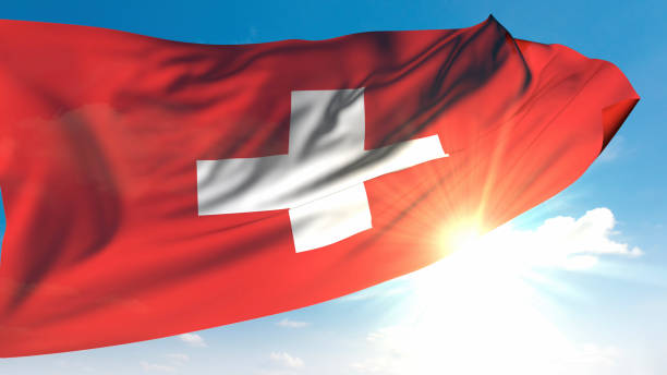 istock Swiss Flag Waving in Sunny Sky 2182785319