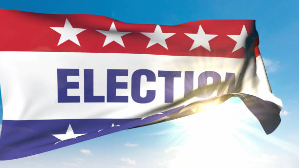 In the bright sunlight, the occasional wink of the sun behind the waving ELECTION flag gives hope. / You can see the animation movie of this image from my iStock video portfolio. Video number: 2182599741