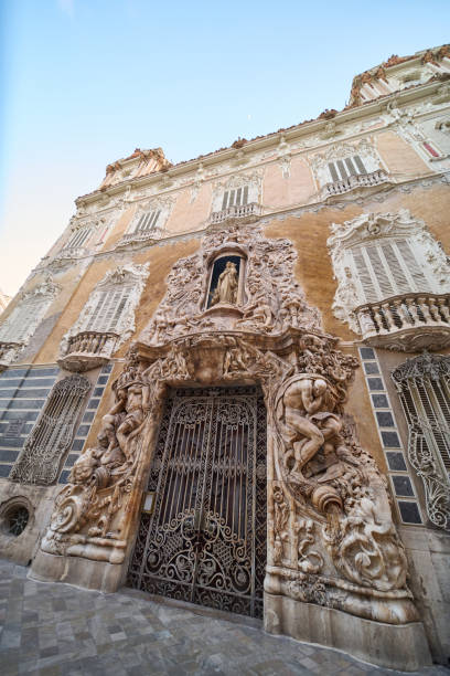 istock a large brown and white building with an iron gate at the front 2182789695