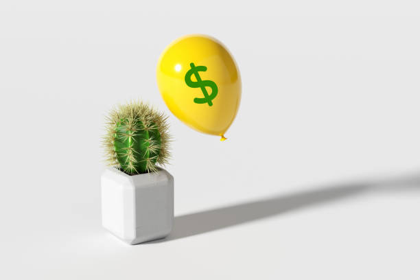 istock Yellow balloon with dollar sign floating away from a cactus in a white pot. 3D render 2182789896