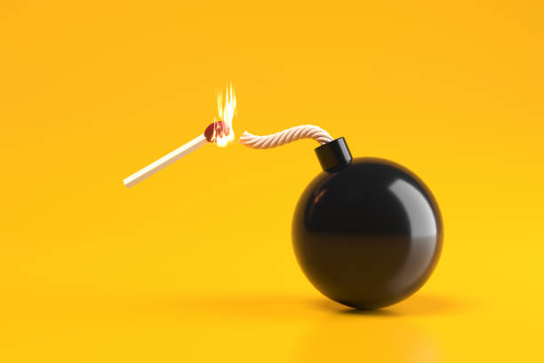 Risk, threat, danger and explosion concepts. Burning match about to light the fuse of a round black bomb on a yellow background. 3D render