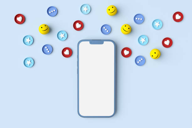 istock Smartphone showing social media reaction emojis on blue background 2182790104