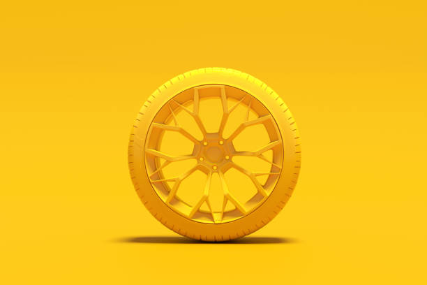 Car tire service. Bright yellow car wheel or tire on a matching background. Ideal for banners or posters, this trendy image catches the eye of any car enthusiast. 3D render