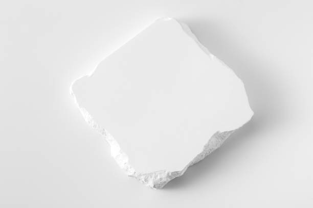 istock White cracked concrete slab on white background 2182790561