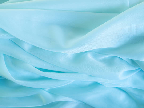 istock Blue cloth background fabric texture color pattern gradient Silk luxuty textile light banner material fashion satin backdrop blur template display mokcup summer abstract poster line shape wallpaper. 2182795071