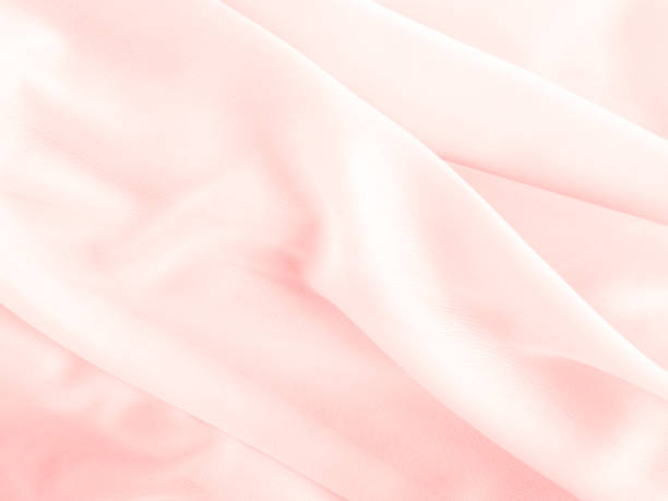 istock Background pink silk clouth wave abstract texture soft tablecloth cotton textile backdrop cosmetic beauty template presentation, silky velvet linen mockup cloth dress curtain backdrop clothing. 2182795089