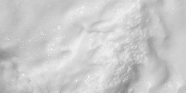 istock Background white Soap foam. Soft colorful bubbles and motoin blur 2182795203